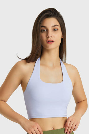 Light purple halter neckline sports bra with ruched back detail