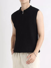 Black ribbed knit zip-up tank with collar and sleeveless design.