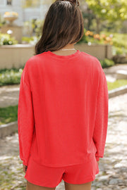 Orange-Red ribbed knit matching set with crew neck top and shorts