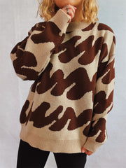 Graphic Wave Knit Sweater in camel and dark brown with a crew neck and long sleeves.