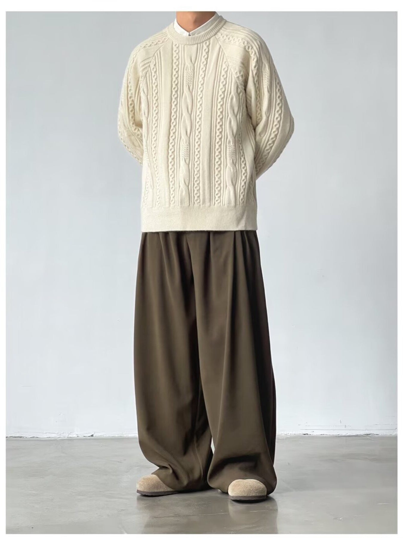 Men's dark brown wide leg casual sweatpants with a relaxed fit.