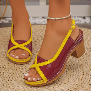 Burgundy and yellow open-toe block heel sandals with adjustable ankle strap.