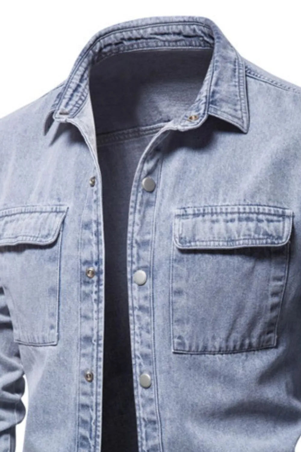 Light faded denim utility shirt jacket with two chest pockets and button front.