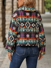Southwestern sherpa button-up jacket in multicolor with geometric pattern and balloon sleeves.
