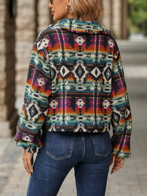 Southwestern sherpa button-up jacket in multicolor with geometric pattern and balloon sleeves.