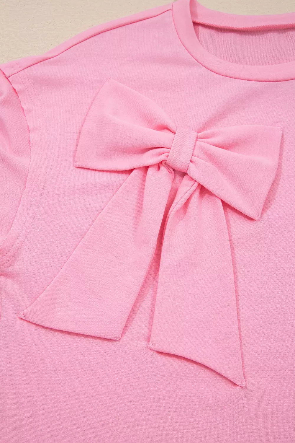 Solid Color Raw Edge Bow Patch Loose T Shirt in Pink, alternate angle
