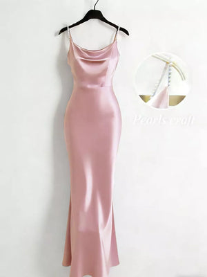 Apricot cowl neck maxi dress with pearl strap detail.
