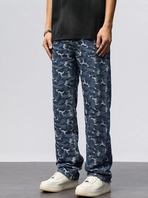 Relaxed fit blue cotton jeans with an abstract camouflage pattern