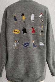 Dark gray acrylic knit sweater with embroidered characters and speech bubbles.