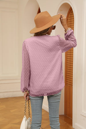 Light Mauve Swiss dot blouse with poet sleeves and lace cuffs.