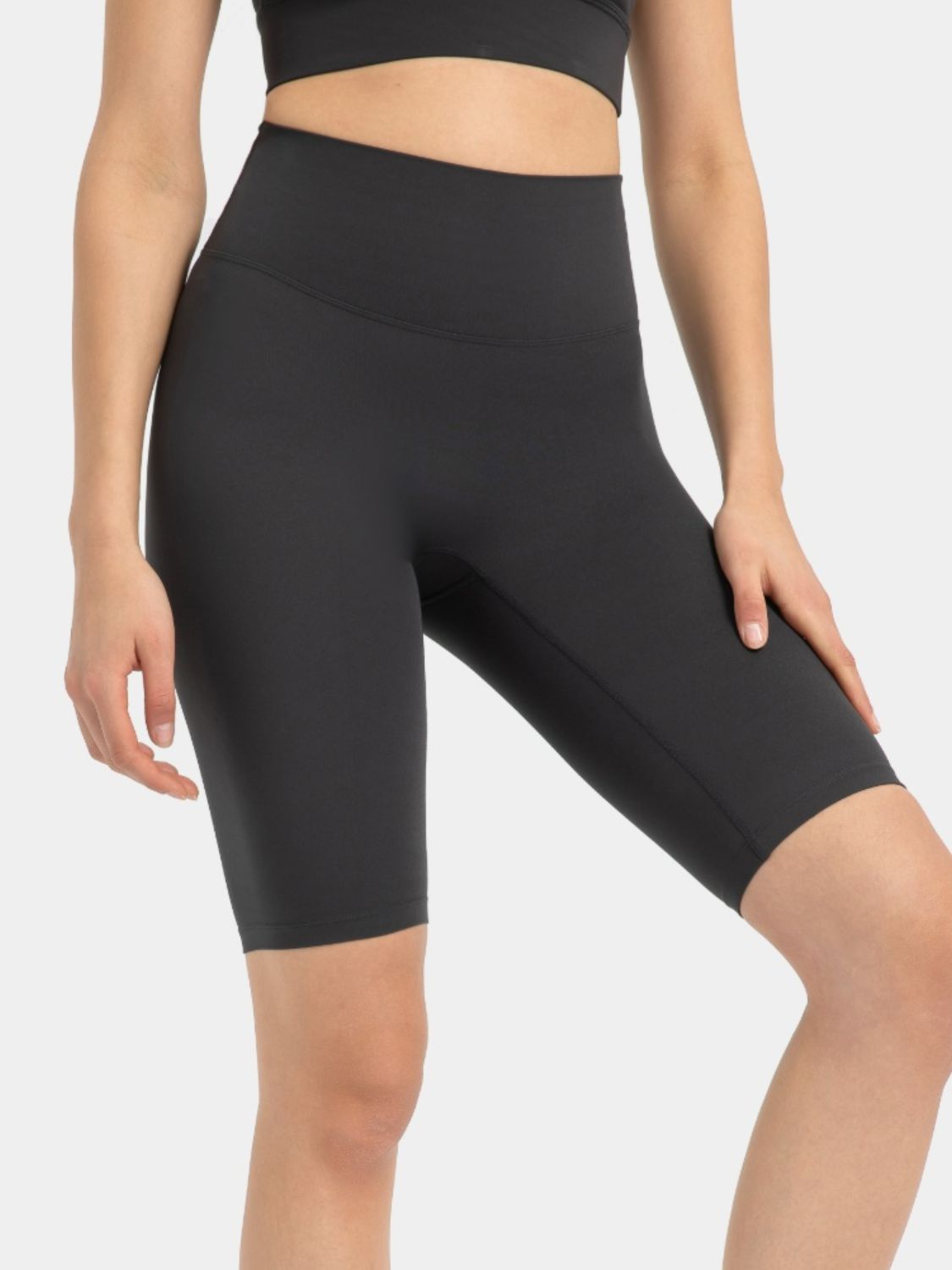 Sculpted Active Bike Shorts in Dark Gray with a high waist and mid-thigh length.