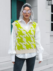 Houndstooth knit v-neck pullover vest in lime and cream acrylic with ribbed trim.