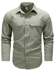 Bean Green cotton overshirt with buttoned flap chest pockets and long sleeves.
