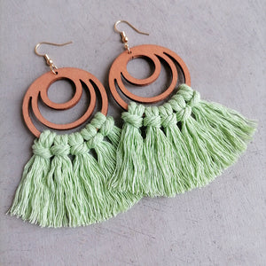 Macrame tassel and wood circle earrings in Gum Leaf with knotted detail.