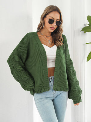 Textured sleeve open-front knit cardigan in army green acrylic with bubble detail on sleeves.