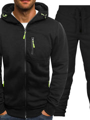 Black tech tracksuit set with zip-up hoodie and contrast neon green zipper details.