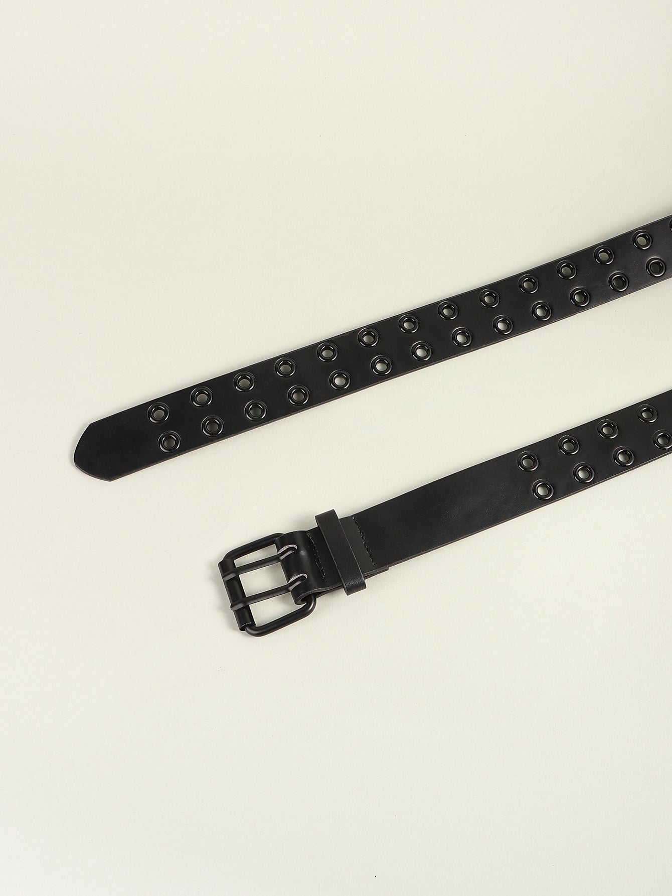 Black vegan leather belt with double grommets and a double buckle.