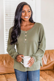 Waffle knit henley pullover in Matcha Green with button detail and v-neck.