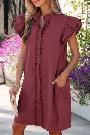 Ruffled button-down denim mini dress with ruffled sleeves and pockets.