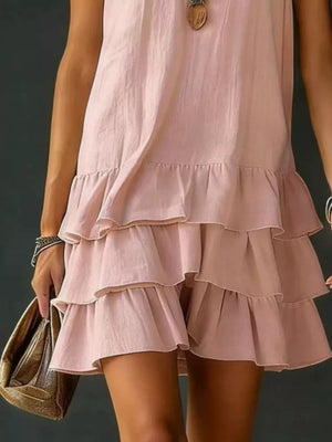 Pink tiered ruffled hem V-neck dress with a casual, airy style.
