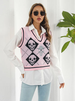 Pink argyle knit vest with skull motif and V-neck.