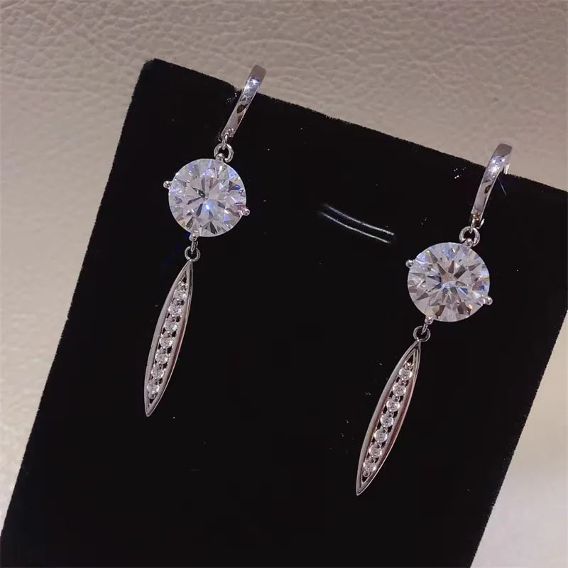 Silver moissanite orb & pavé dangle earrings with 925 sterling silver.