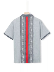 Men's gray short sleeve shirt with bold red and black geometric print panel.
