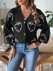 Black cardigan with white ghost motif, V-neck, buttoned front, and balloon sleeves.