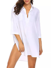 White oversized collared shirt with button front and side slits, polyester