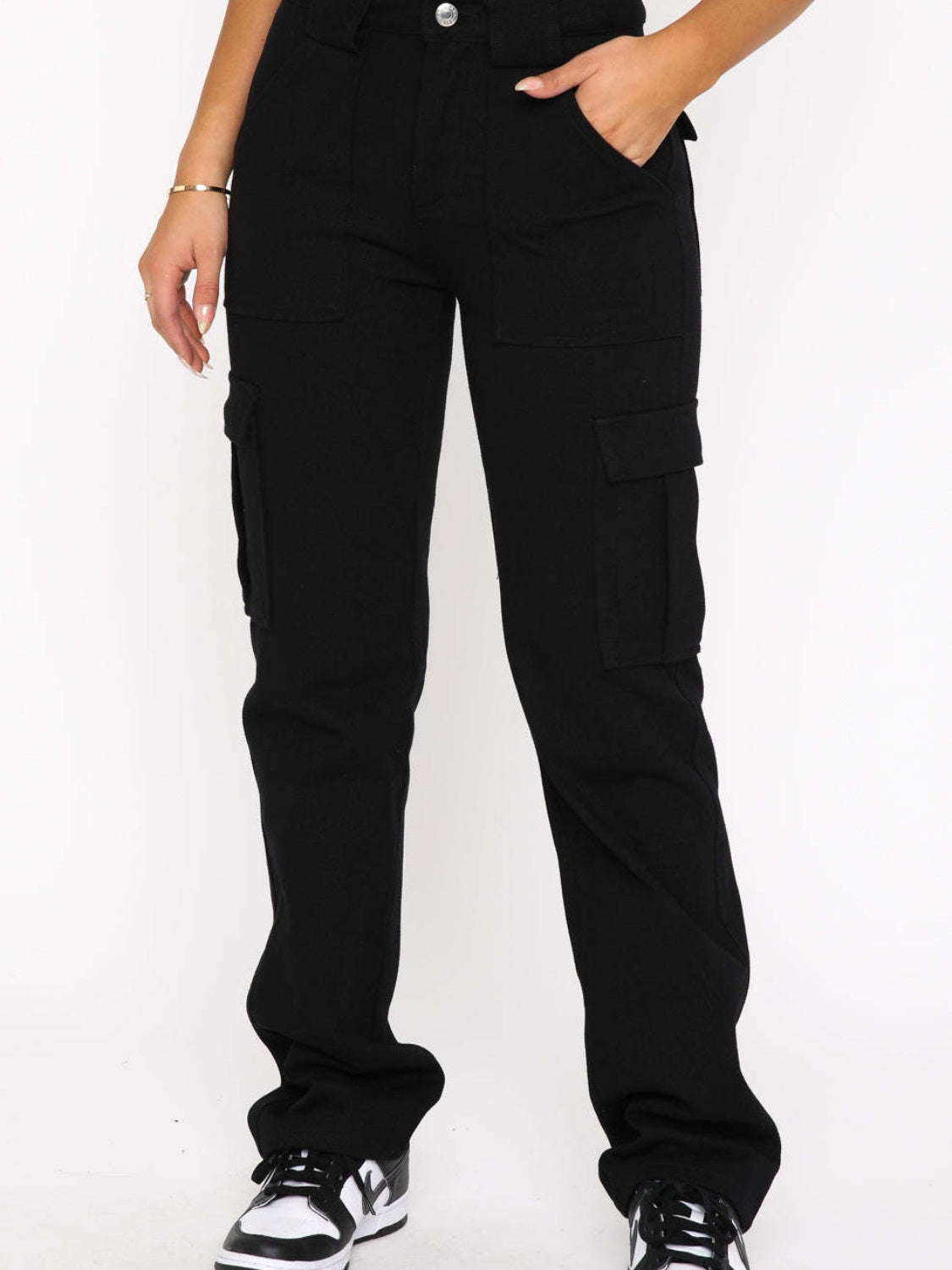 Black straight leg cargo trousers with multiple utility pockets.