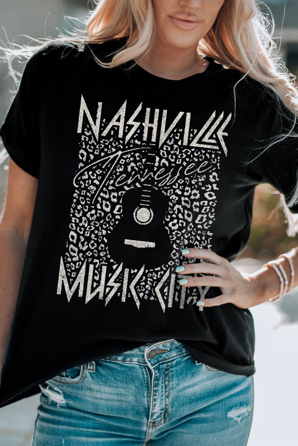 Black graphic tee with Nashville Music City print and leopard pattern detail