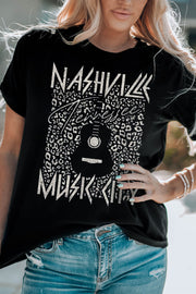 Black graphic tee with Nashville Music City print and leopard pattern detail