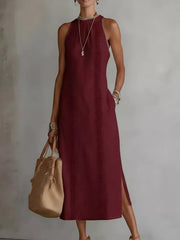 Burgundy sleeveless midi dress with geometric trim and pockets.