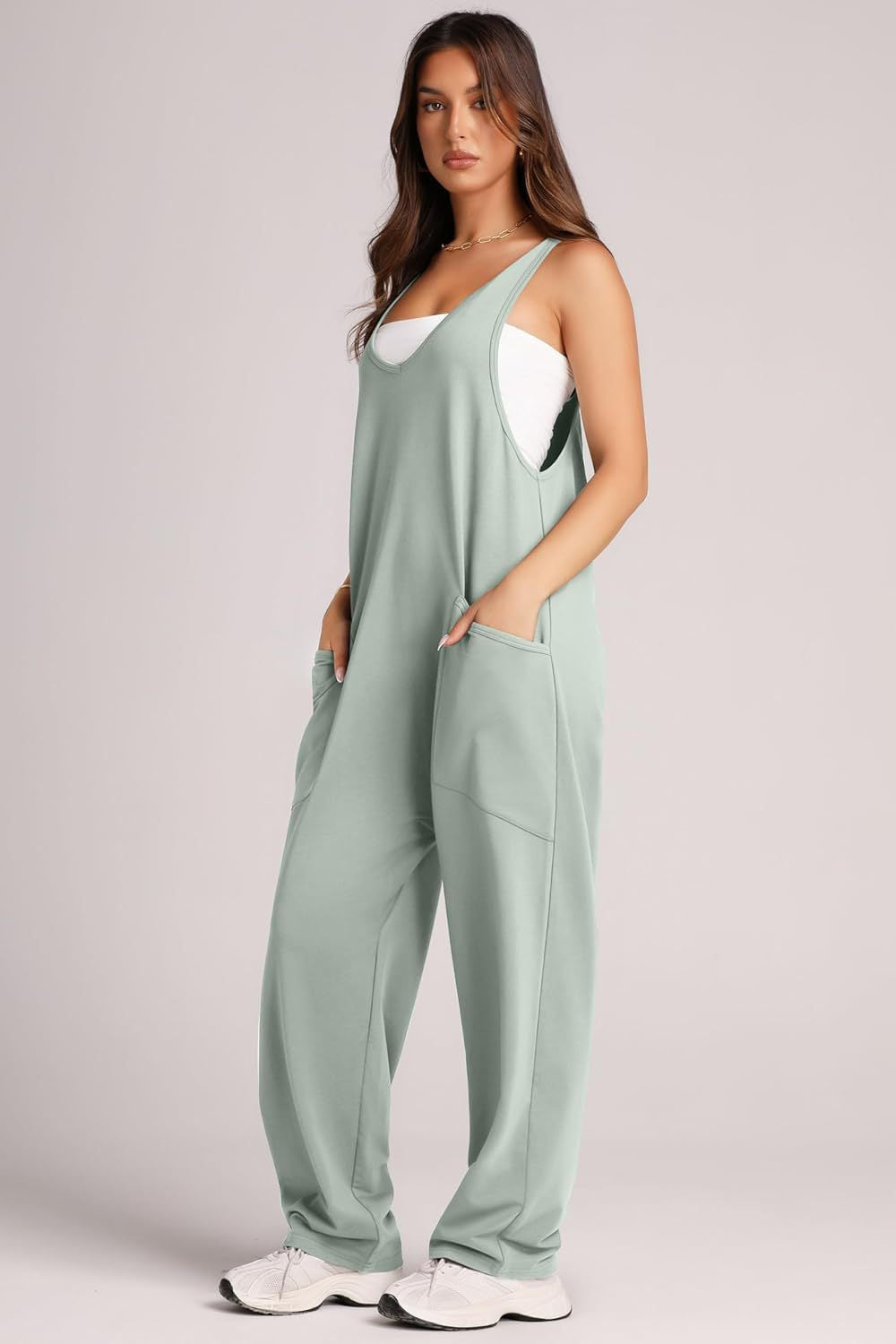 Relaxed fit tank jumpsuit in Matcha Green with deep pockets and a scoop neckline.
