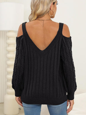 Black open shoulder cable knit sweater with V-neck and ribbed detail.