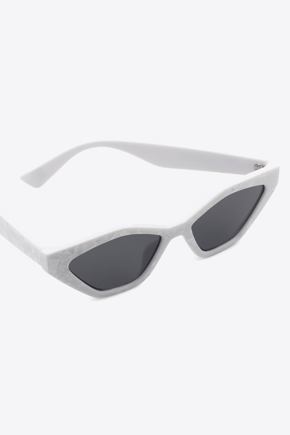 Geometric cat-eye sunglasses in light gray with a marbled pattern and dark lenses.