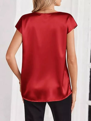 Red satin V-neck maternity shirt with short sleeves and a relaxed fit.