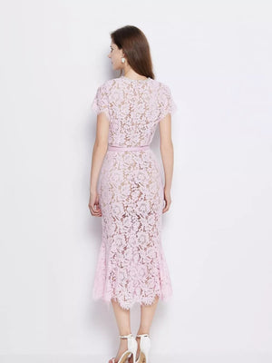 Powder floral lace mermaid dress with short sleeves and a matching belt.