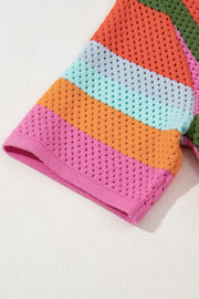 Multicolor striped openwork knit top with short sleeves and a pink hem.
