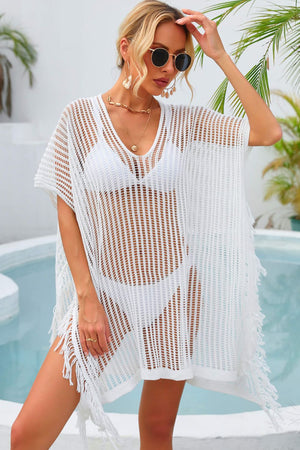 White open-knit beach cover-up with fringe detail and V-neck.