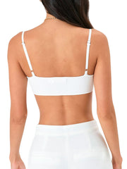 White ribbed knit bustier with delicate adjustable straps shown from the back.
