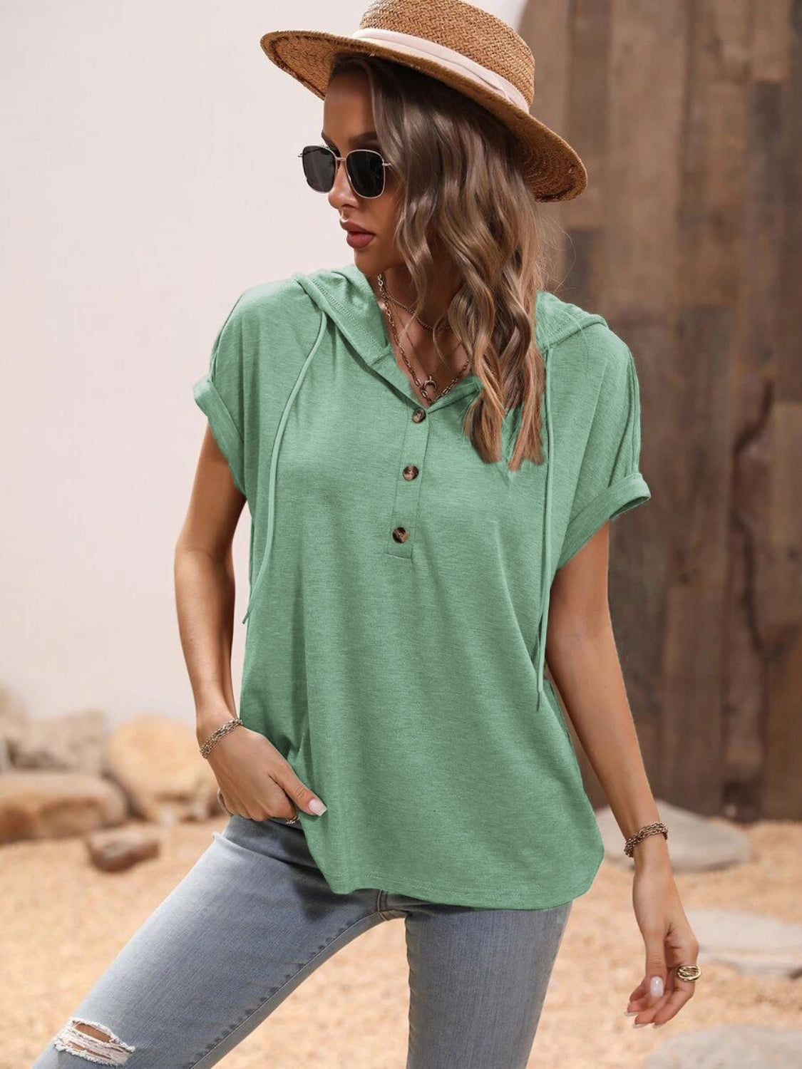 Light Green Relaxed Henley Hoodie with rolled short sleeves and button neckline.