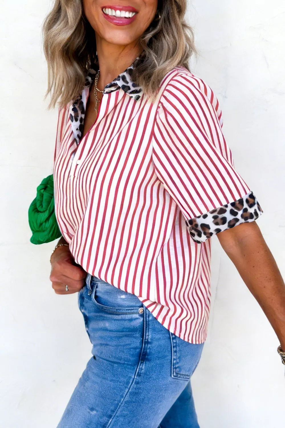 Red and white striped shirt with leopard print collar and cuffs.