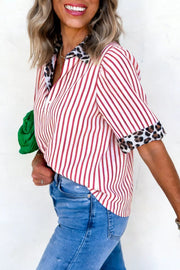 Red and white striped shirt with leopard print collar and cuffs.