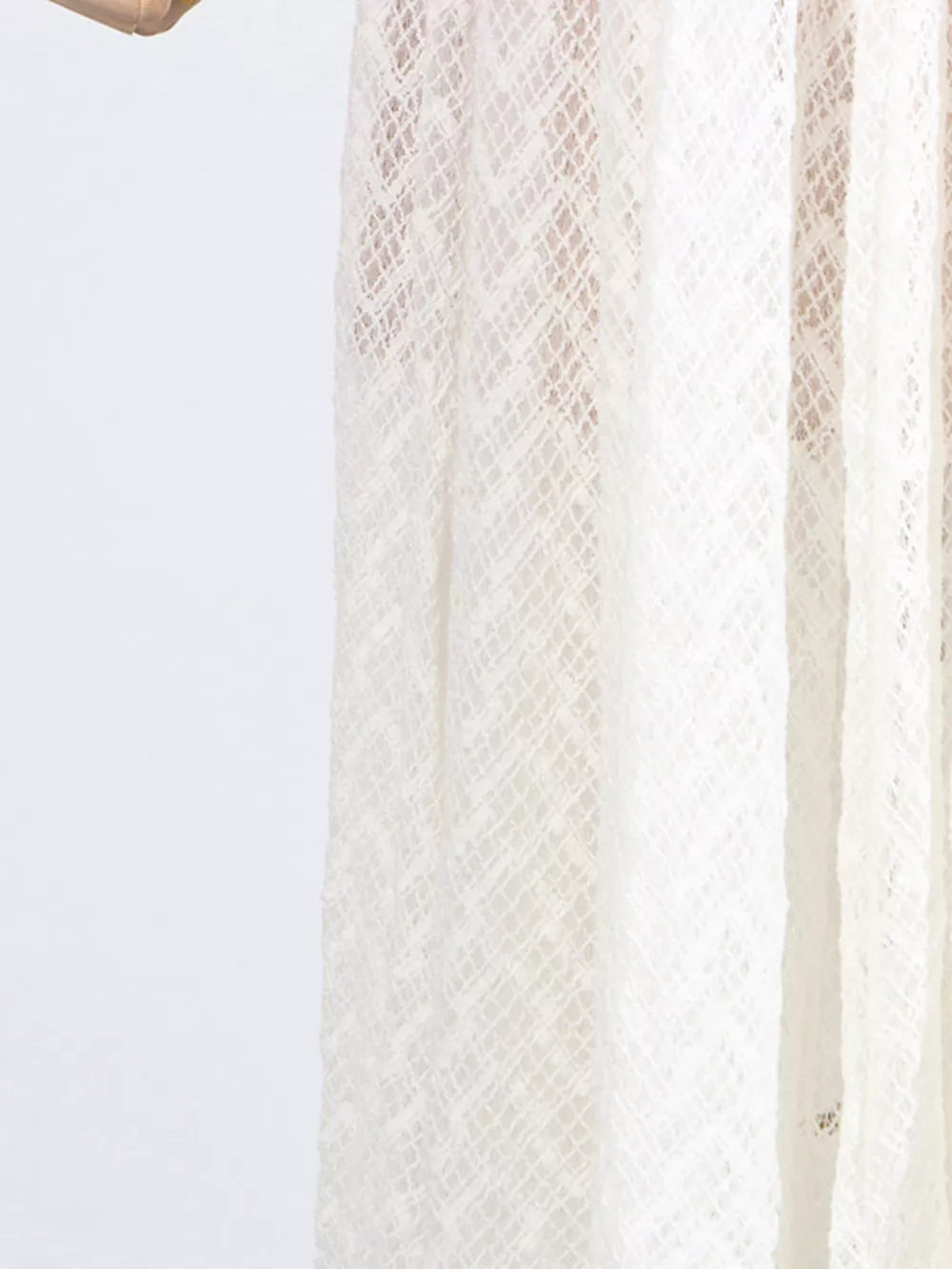 White lace maxi dress with diamond pattern detail
