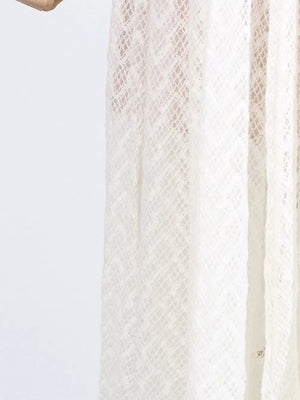White lace maxi dress with diamond pattern detail