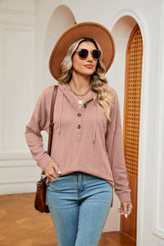 Pink textured henley hoodie with drop shoulder and button detail