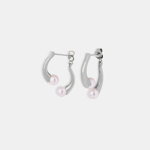 Silver sculptural drop hoop earrings with pearl accents