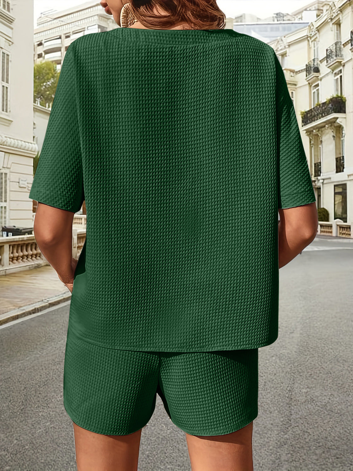 Dark green waffle knit drawstring co-ord set with short sleeves and shorts.