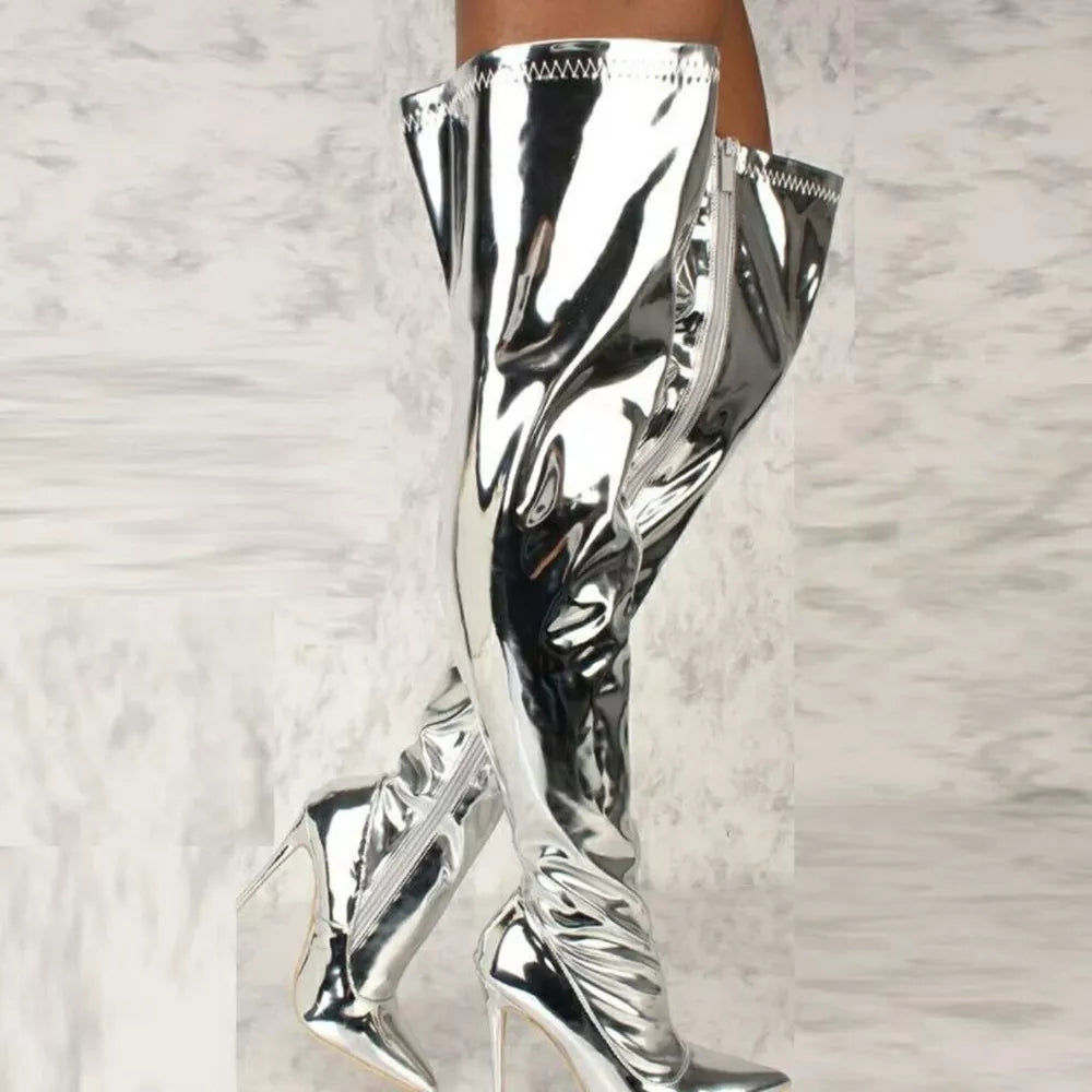 Silver thigh-high stiletto boots with side zippers and a shiny metallic finish.